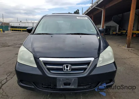 2007 Honda Odyssey Exl z USA, uszkodzony, nr VIN 5FNRL386X7B092013